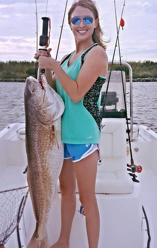 Melesa Farmer caught this nice bull redfish in Mobile Bay while fishing with her dad.