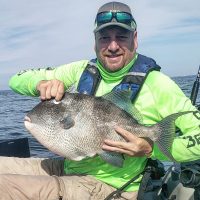 Barrett Fine with a 10.3 lb. triggerfish caught off Navarre, FL.