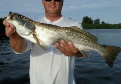 Mike Barker, inventor of The Chum Buddy, shows off a speckled trout caught while getting his first inshore slam!