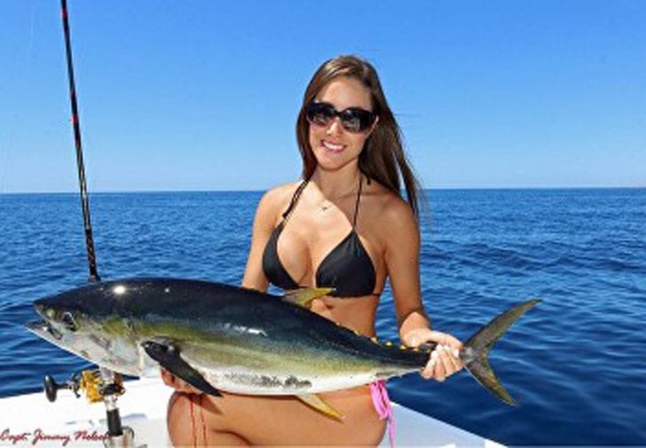 Luiza shows off a nice tuna. For more information on this amazing lady angler, go to: www.fishingwithluiza.com 