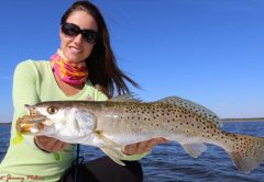 Luiza shows off a nice Speckled Trout. For more information on this amazing lady angler, go to: www.fishingwithluiza.com