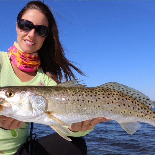 Luiza shows off a nice Speckled Trout. For more information on this amazing lady angler, go to: www.fishingwithluiza.com