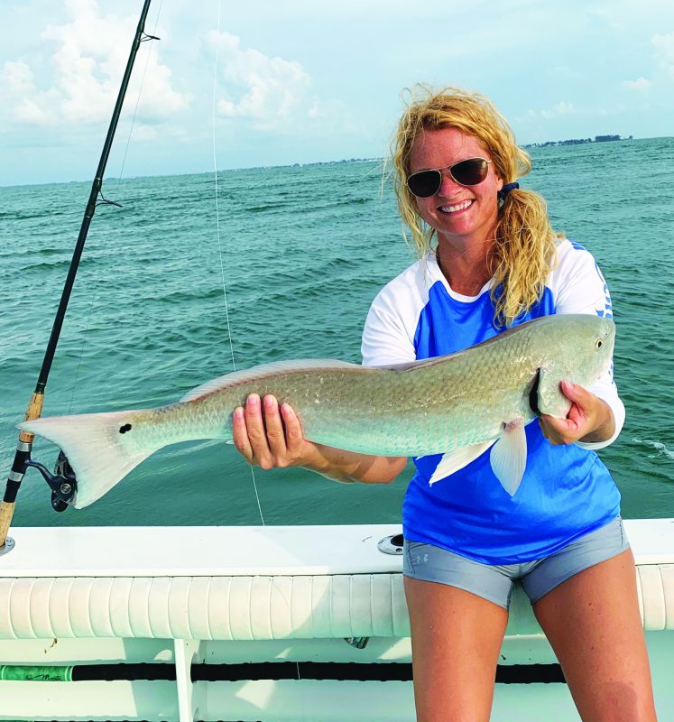 Shannon Baxter w/ her 1stbig red using a crab, off Egmont Key