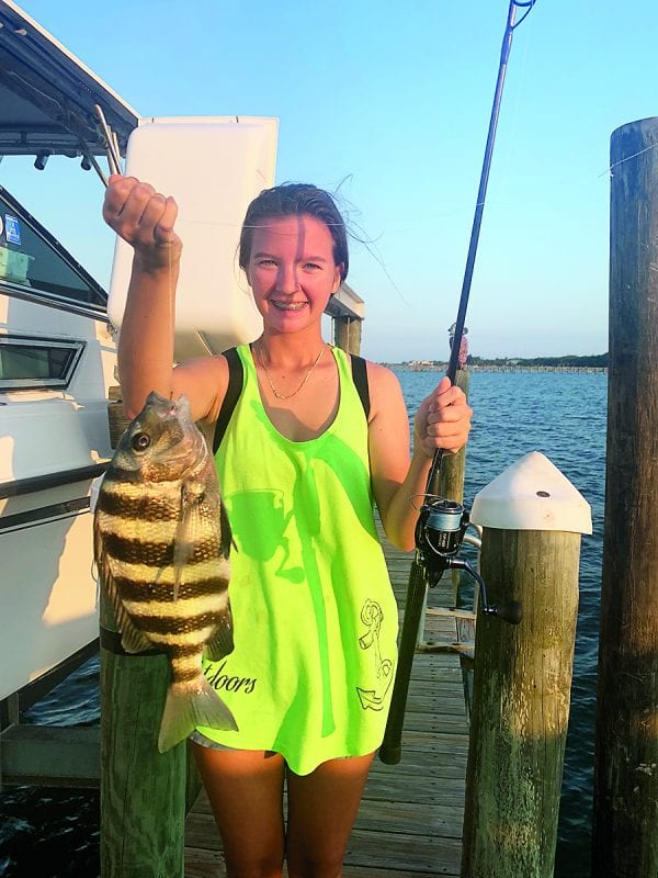 Emily Hanzlik with a nice sheepshead caught on a live fiddler crab ...