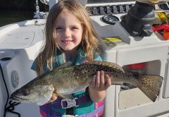 Little 3-year-old Gracie caught a nice 18" spotted seatrout in chilly water using a Slayer Inc. paddle tail fishing with her dad, Captain Shane Trottier of Whatever Turns U On Fishing Charters.