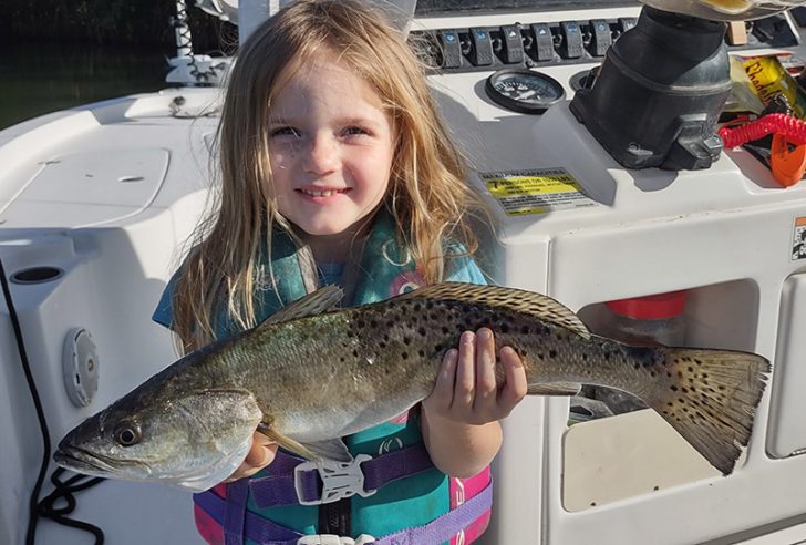 Little 3-year-old Gracie caught a nice 18″ spotted seatrout in chilly ...