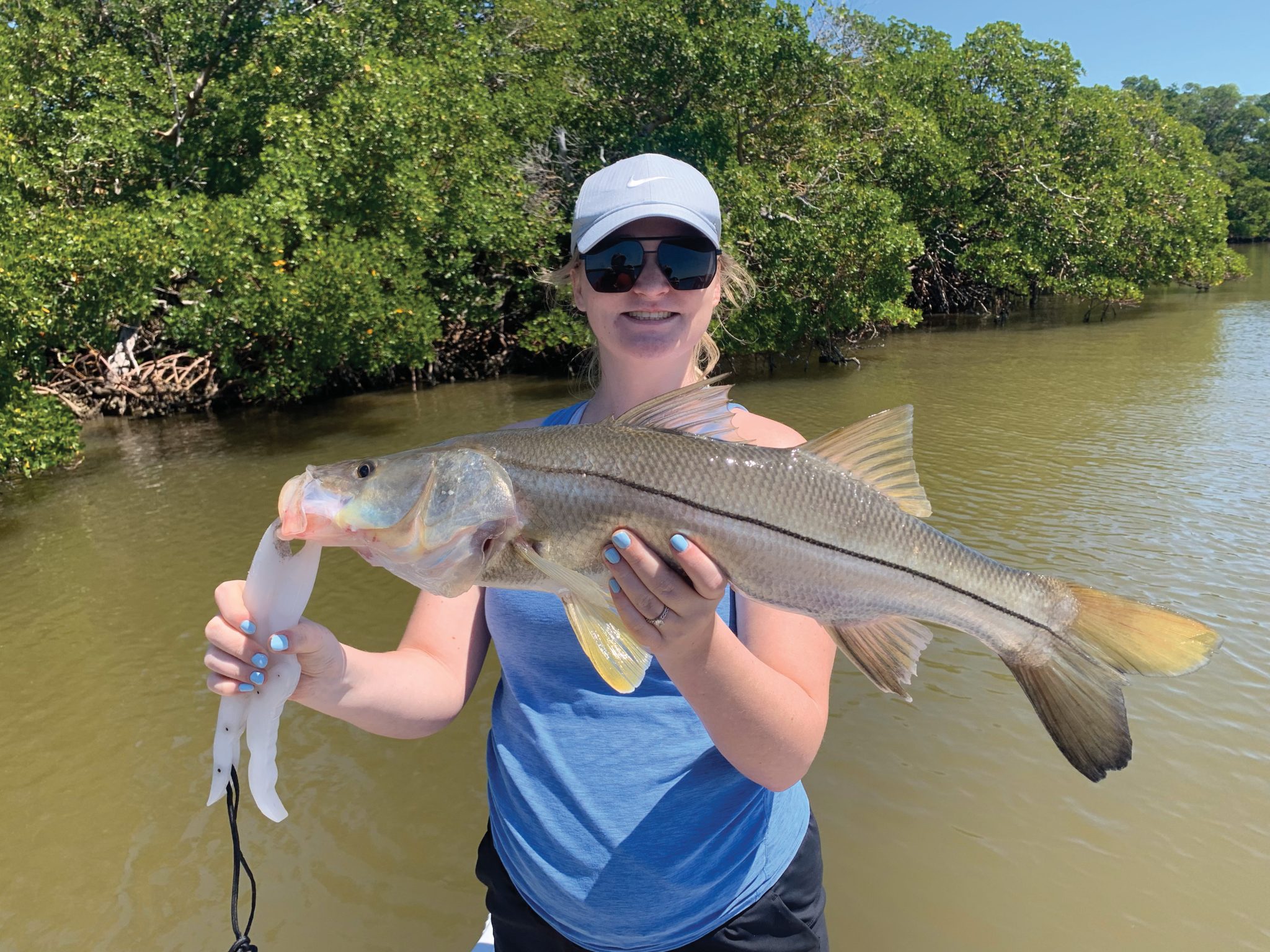 Macey with a nice backcountry Snook in Naples on a Redfish Rob’s ...