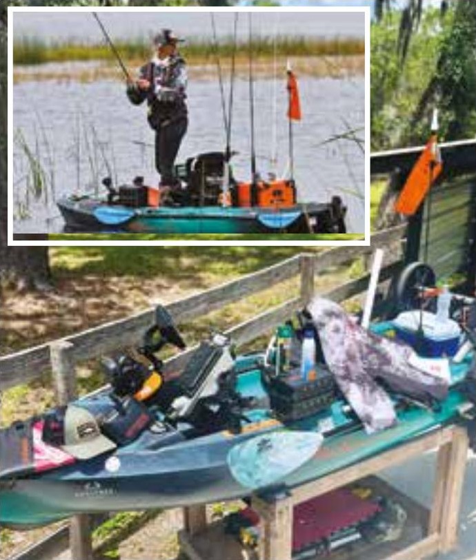 An angler standing and casting from a fishing kayak on a grassy lake, inset over a kayak on a stand loaded with a cooler, a safety flag, a paddle, and gear