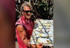 Marco Pompano with a tray of pompano and permit