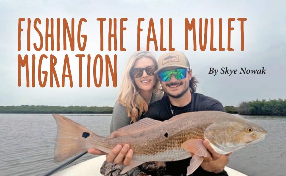 Fishing the Fall Mullet Migration by Skye Nowak: two anglers holding a redfish